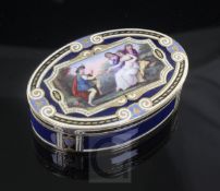 An early 19th century Swiss 18ct gold and enamelled oval snuff box, the hinged lid decorated with