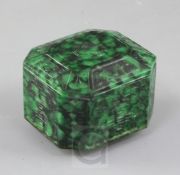 A Chinese carved Maw Sit Sit jade box and cover, 20th century, of elongated octagonal form, carved