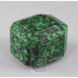 A Chinese carved Maw Sit Sit jade box and cover, 20th century, of elongated octagonal form, carved