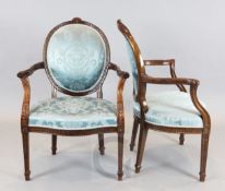 A set of sixteen Hepplewhite design mahogany elbow chairs, with blue silk fabric upholstery and