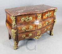 A Louis XV ormolu mounted kingwood bombe commode, with serpentine rouge marble top, two short and