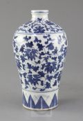 A Chinese blue and white meiping, painted with scrolling flowers and foliage, bearing a Yongzheng