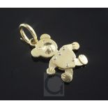 An Italian 18ct gold Pomellato articulating teddy bear pendant, 28mm.