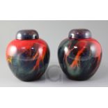 A pair of Royal Doulton 'Sung' ware flambe glaze ginger jar and covers, early 20th century, black