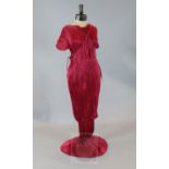 A rare Mariano Fortuny rose red finely pleated Delphos three quarter length tunic and matching