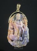 A gold mounted polychrome corundum pendant carved with the figure of Guan Yin, with certificate,