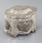 JUDAICA: A mid 19th century Polish 84 zolotnik silver etrog box, of serpentine form, with embossed