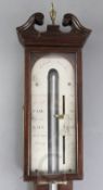 D. Richards, Marazion. A George III mahogany and crossbanded stick barometer, with silvered scale