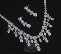 A silver and cubic zirconia fancy fringe necklace and pair of matching earrings, necklace 51cm.