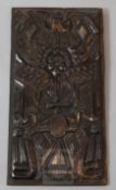 An 17th century oak panel, carved with an angel, 19 x 10in.