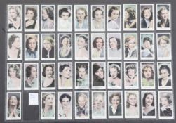 Two folio albums of cigarette cards on the theme of Stars of the Screen and Beauties, mainly full