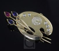 A Swiss 18ct gold, diamond and gem set novelty combination brooch with watch (dial signed