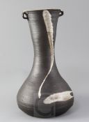 A large St Ives pottery baluster vase, by Janet Leach, with a pair of lug-shaped handles to the neck