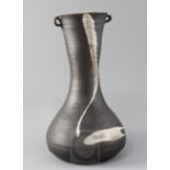 A large St Ives pottery baluster vase, by Janet Leach, with a pair of lug-shaped handles to the neck