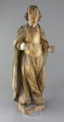 An 18th century Continental carved and painted limewood figure of a saint, H.24in.