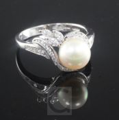 An Italian 18ct white gold, cultured pearl and diamond cluster ring, the pearl with a diamond set