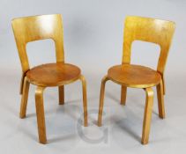 A pair of Finmar Ltd bentwood dining chairs, model 66, designed by Alvar Aalto, with Finmar