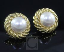 A pair of 18ct gold and mabe pearl circular earrings, retailed by David Morris, with spiral fluted