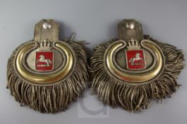 A pair of 19th century Continental silvered brass and silver braid epaulettes, each with crowned