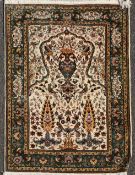 A Persian blue ground carpet, with central medallion in a field of scrolling foliage, 13ft 1in by