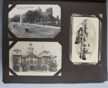 A postcard album of topographical postcards and some loose (200 approx)