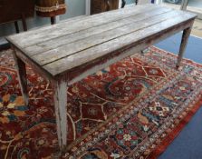 An Early 19th century painted farmhouse table, W.199cm