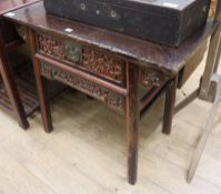 A Chinese carved side table, W.96cm