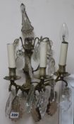 A pair of cut glass wall sconces