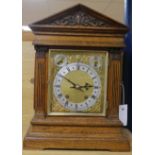 A German oak mantel clock