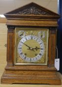A German oak mantel clock