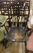 A beech and elm wheelback Windsor armchair,