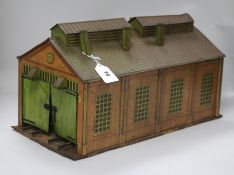 A Hornby twin engine shed tinplate, brickwork design