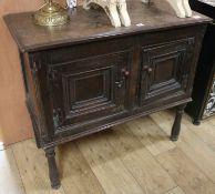 An 18th century oak cupboard, W.94cm