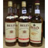 Bells 8 year old whisky (3 in box), 2 x Bells Extra Special whisky, and 1 x litre Bells Extra