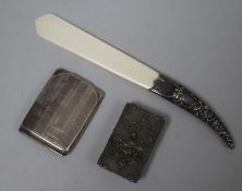 A silver handled letter opener, a sterling silver stamp box and a match holder.