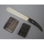 A silver handled letter opener, a sterling silver stamp box and a match holder.