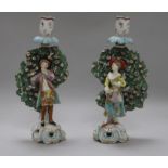 A pair of Derby style candlestick figures