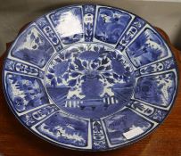 A Japanese arita blue and white charger, circa 1700, restored,