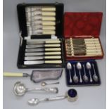 Three cased plated cutlery sets and five other plated items