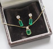 A gold, emerald and diamond pendant on a 14ct gold chain and a pair of similar gold, emerald and