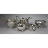 A Victorian silver sugar bowl, Edward Hutton, London, 1883, three other sugar bowls and a cream