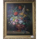 English Schooloil on wooden panelStill life of flowers in a vase upon a ledge62 x 49cm