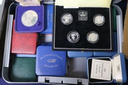 A group of cases proof silver coins