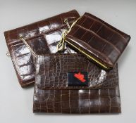 Three crocodile handbags