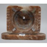 An Art Deco onyx and diamond mantel clock