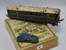 A Victorian 'Hawthorn Farm' jigsaw puzzle with reverse map. a tin plate car and a carriage