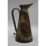 An Arts & Crafts style copper ewer