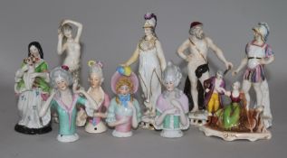 A quantity of mixed figurines, two pairs of Staffordshire, four pin dollies and two others