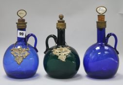 Four 19th century coloured glass decanters