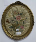 A Victorian silk embroidered panel